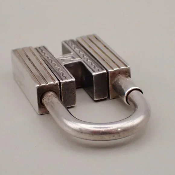HERMES Logo Touareg H Cadena Padlock Bag Charm Silver